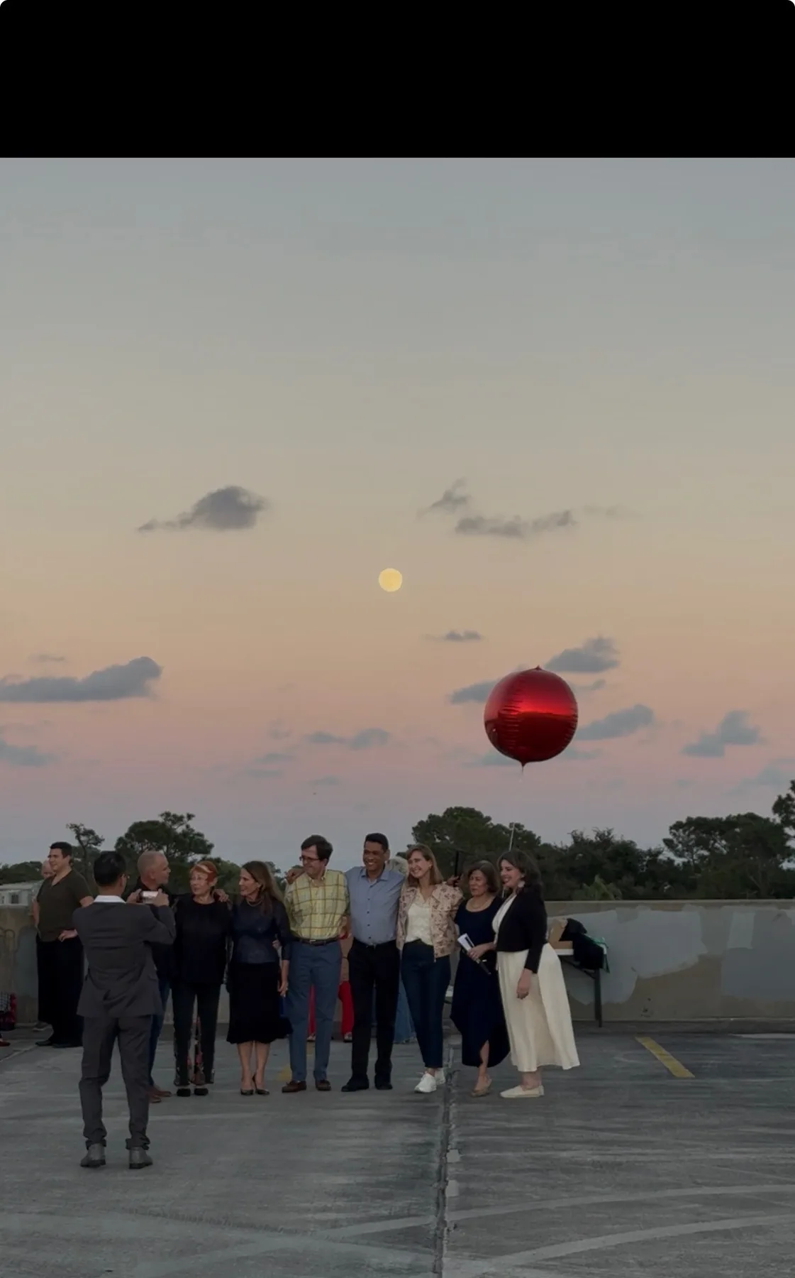 Dance Alday group gathering at sunset