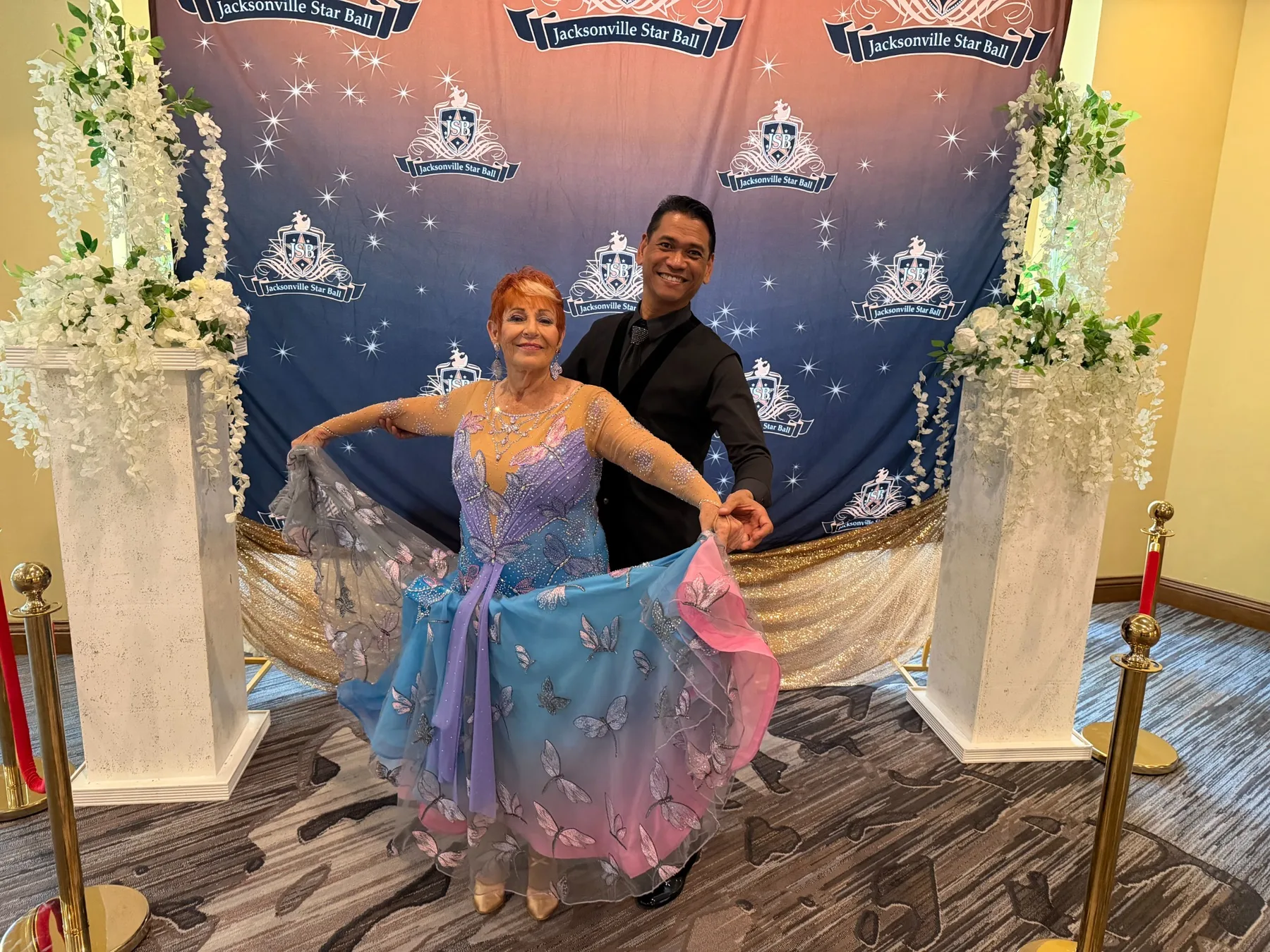 Dance Alday ballroom dancers posing at the Jacksonville Star Ball
