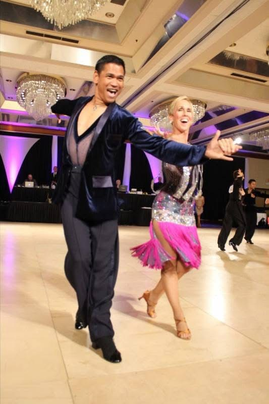 Allan Alday dancing in ballroom competition
